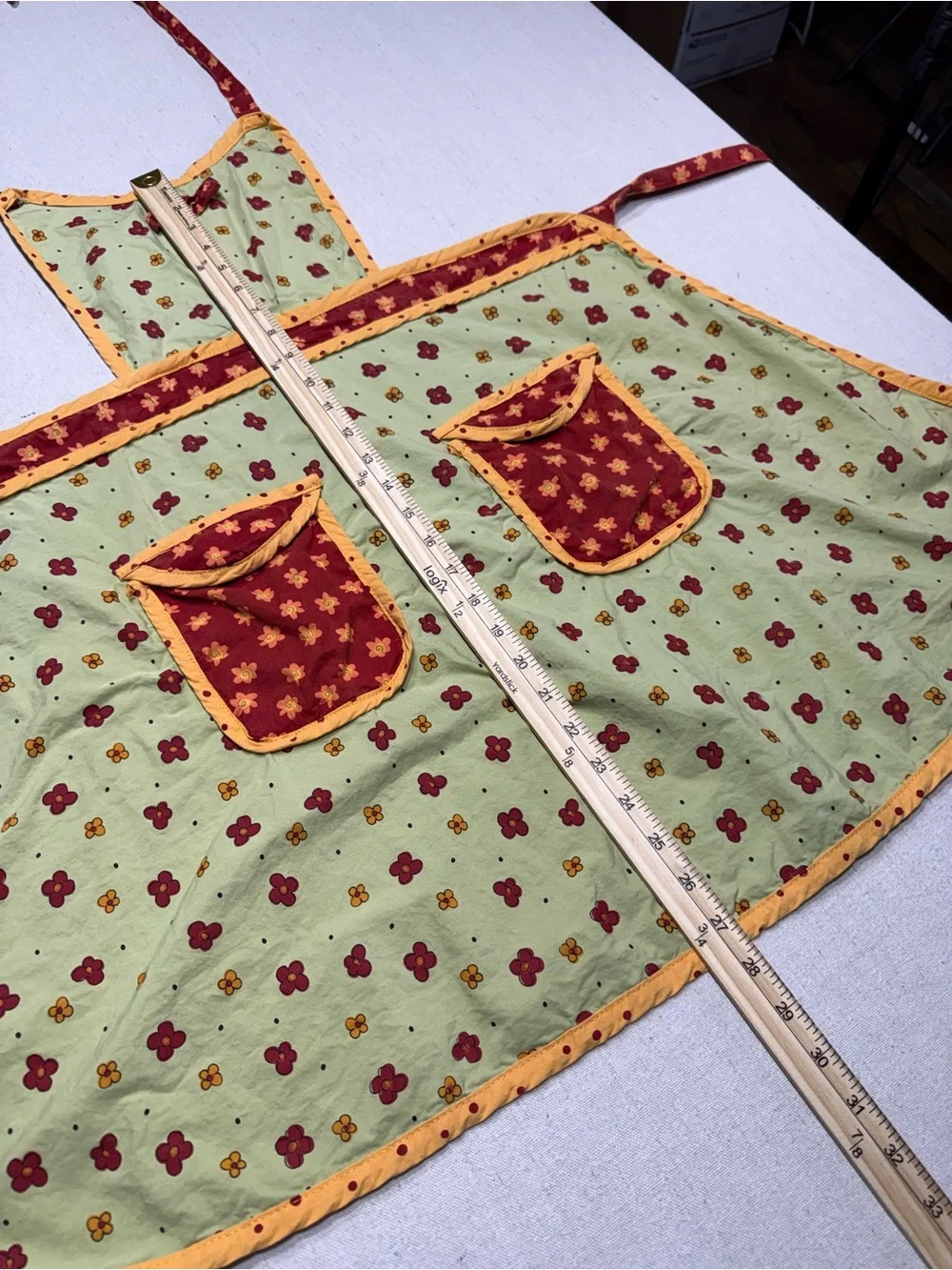 Yellow Floral Apron Dress with Red Accents